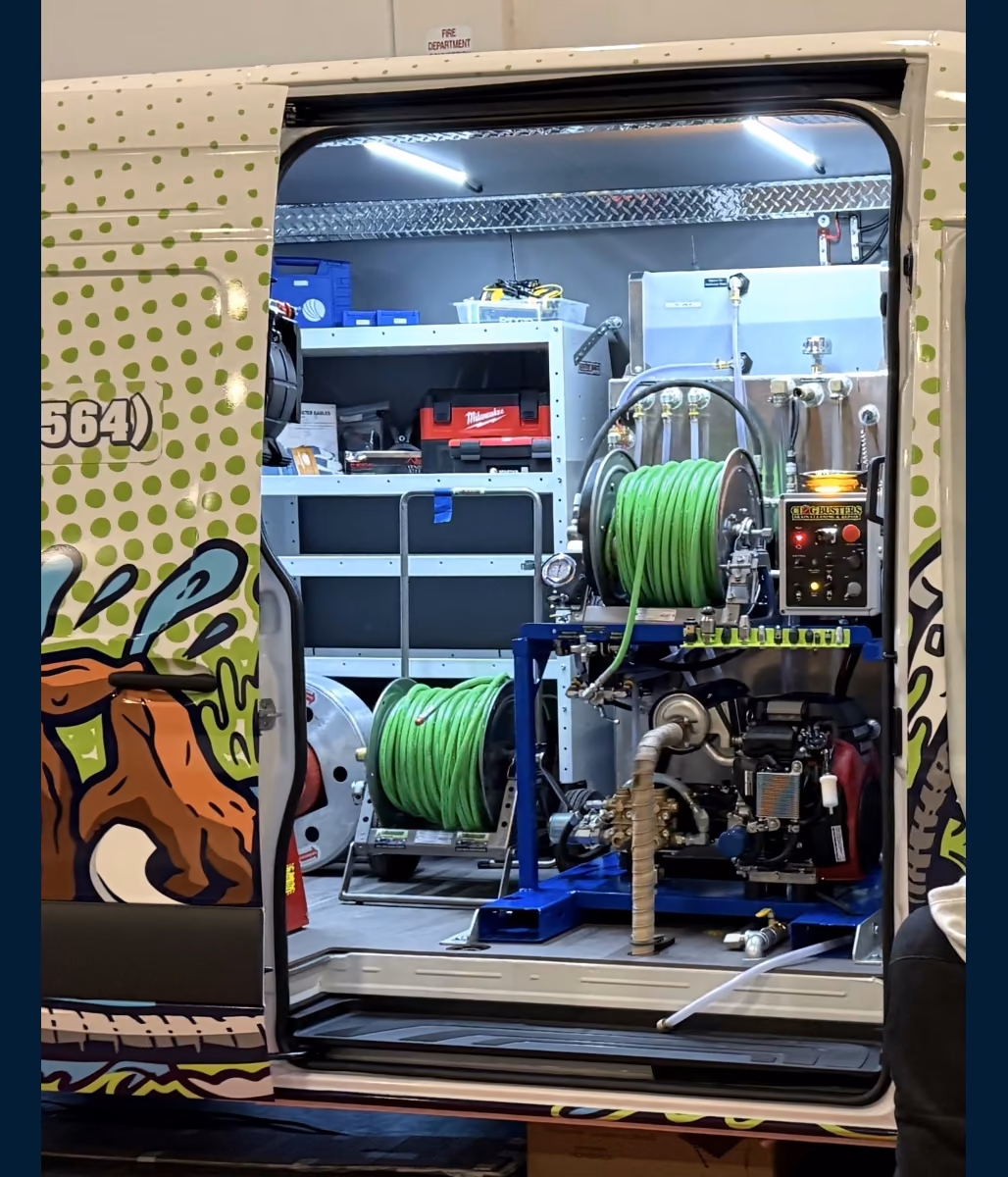 The Perfect VanPak Jetter installed through the side door of a drain cleaning van